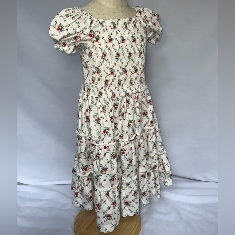 Polo RL white dress with floral detail.